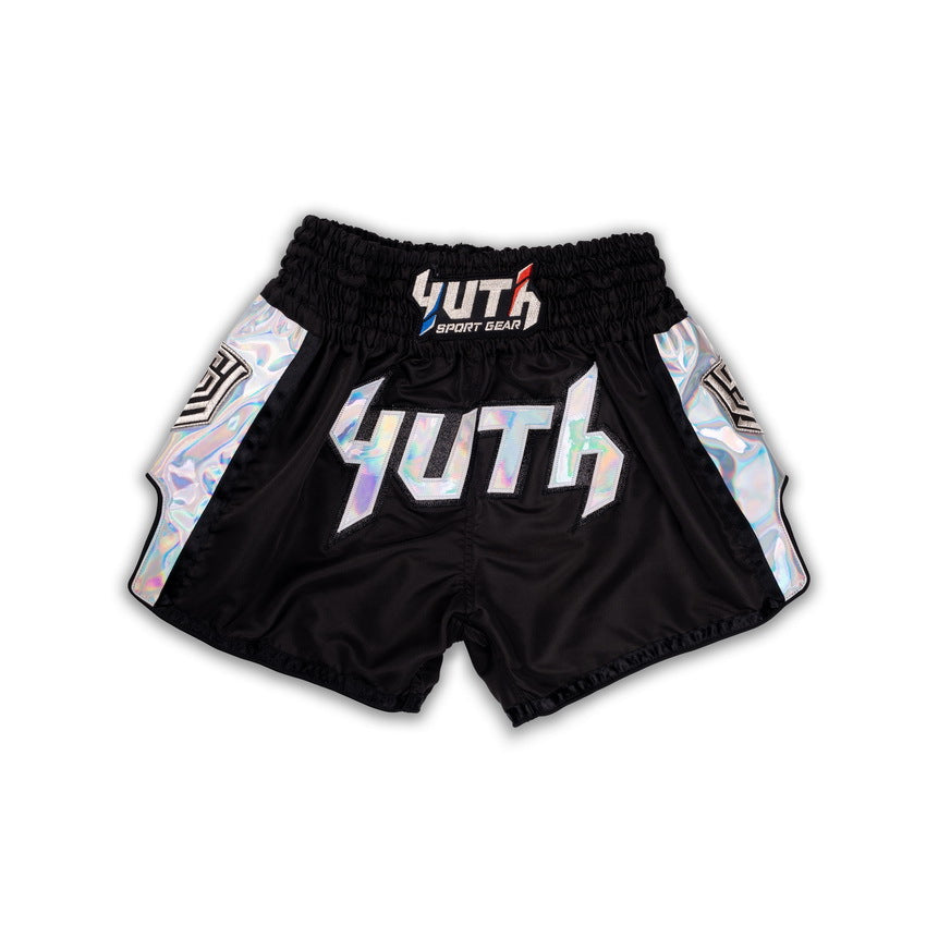 Black Muay Thai shorts with colorful 'YUTH' branding on a white background