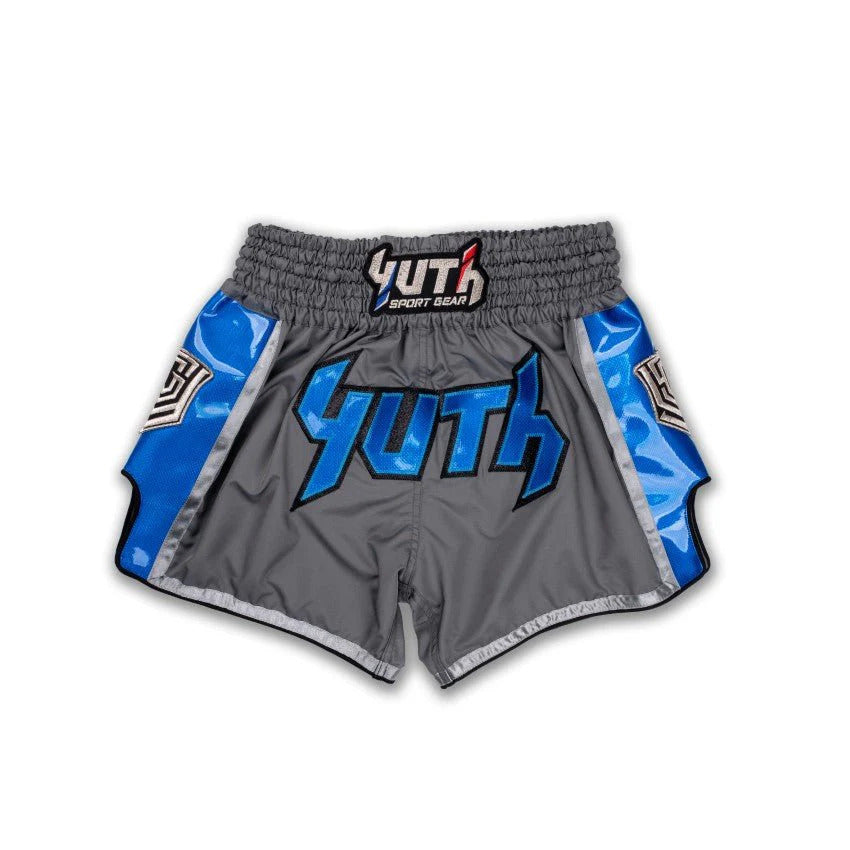 Gray and blue Muay Thai shorts with 'Yuth' branding on a white background