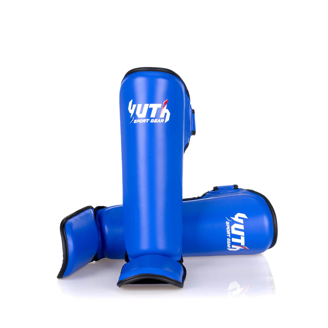 Blue shin guards with 'YUTH' branding on a white background