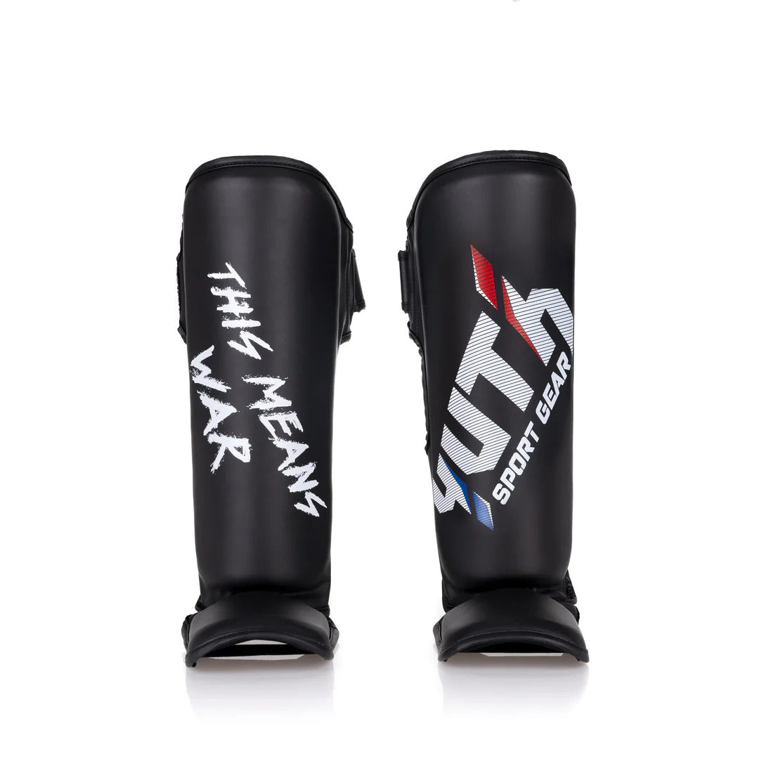 Black shin guards with 'This Means War' and 'YUTH' branding on a white background