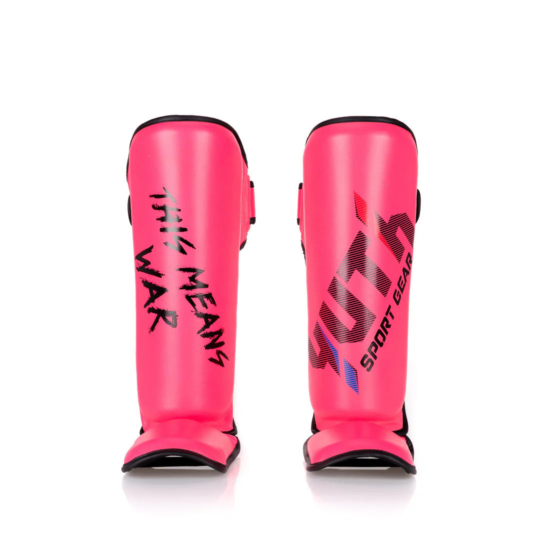 Pink shin guards with black text on a white background