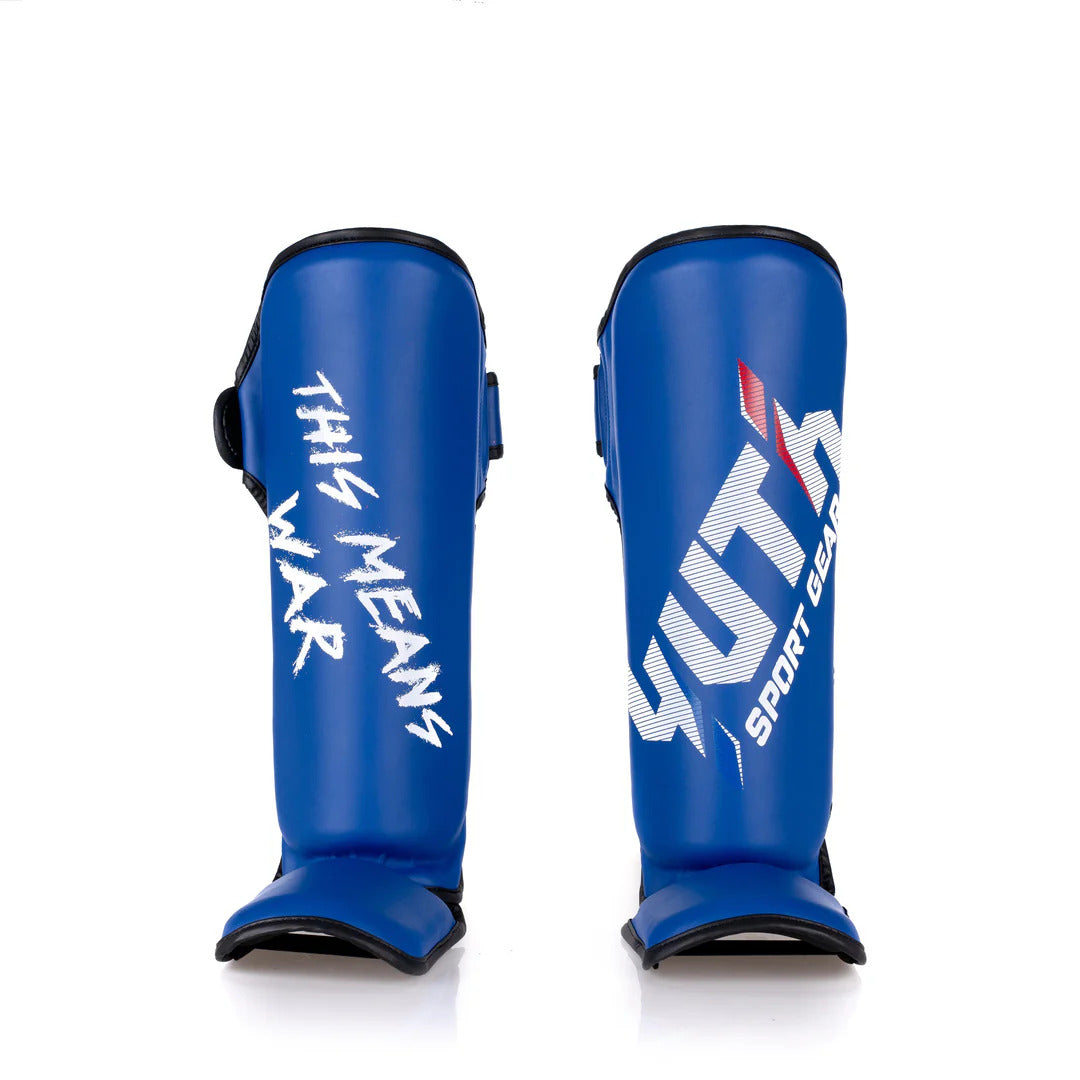 Blue shin guards with text on a white background