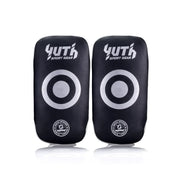 Pair of black thai pads with white circular targets and 'Yuth Sport Gear' branding on a white background.