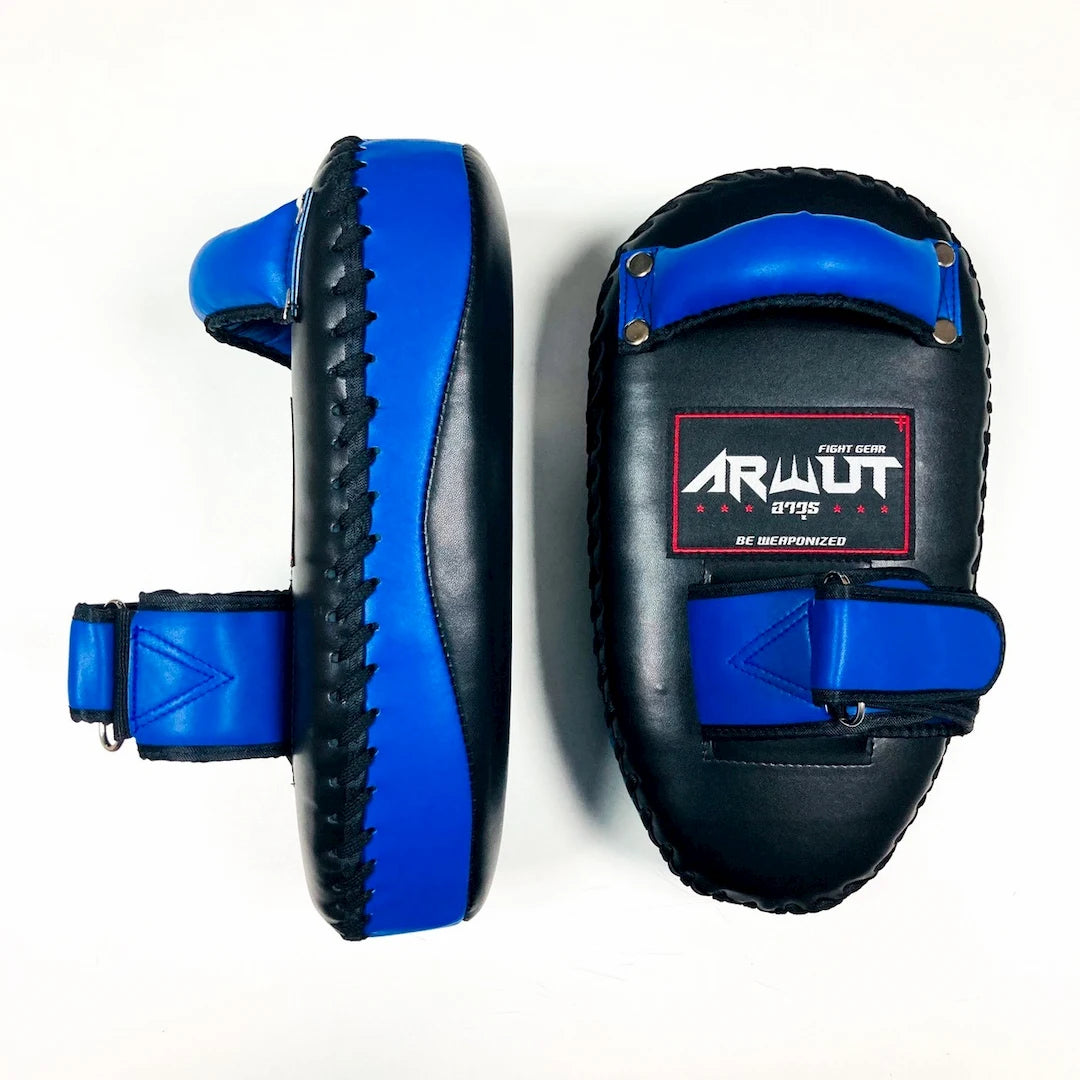 Pair of black and blue Muay Thai pads with 'Armit' branding on a white background.