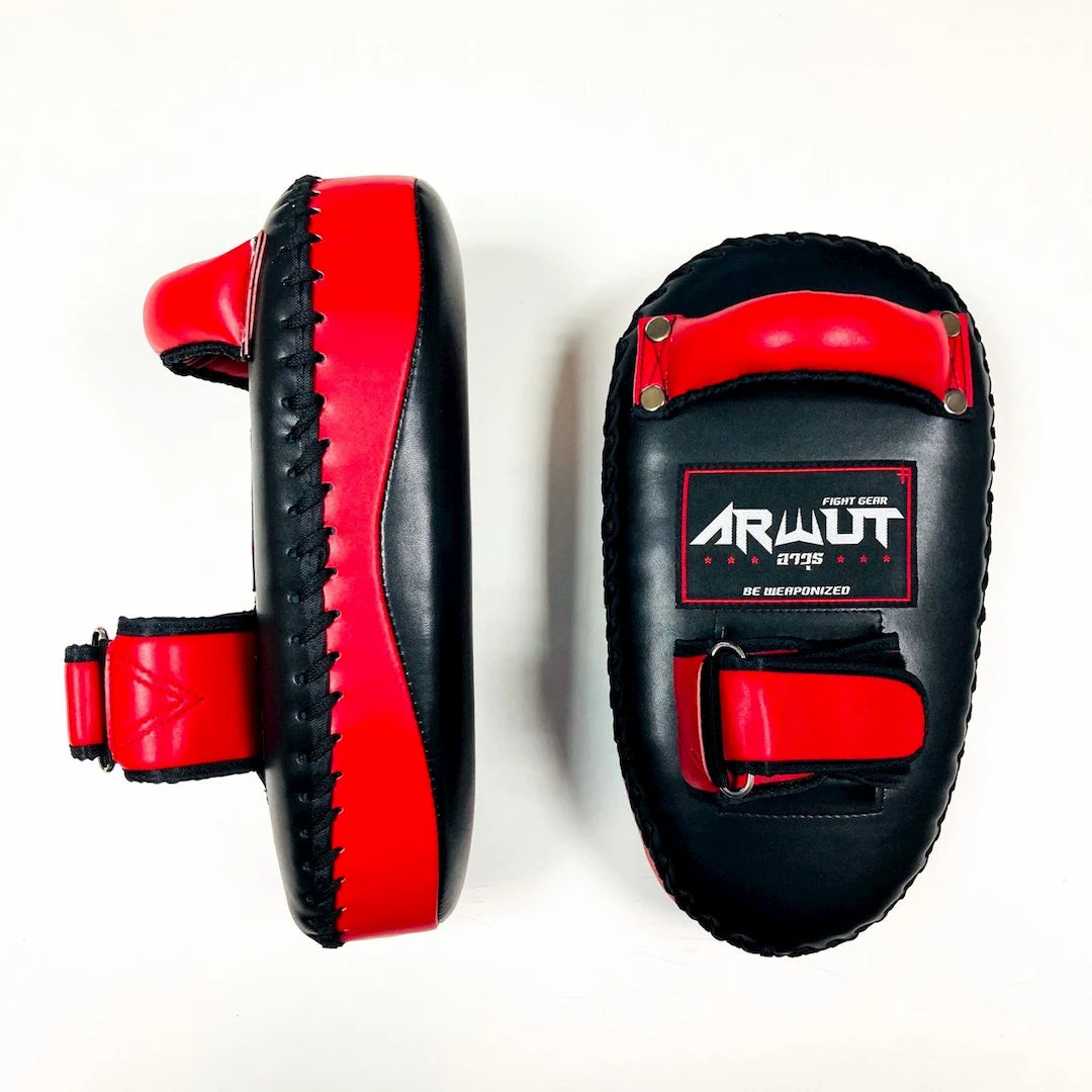 Black and red Muay Thai pads with 'Arwut' branding on a white background