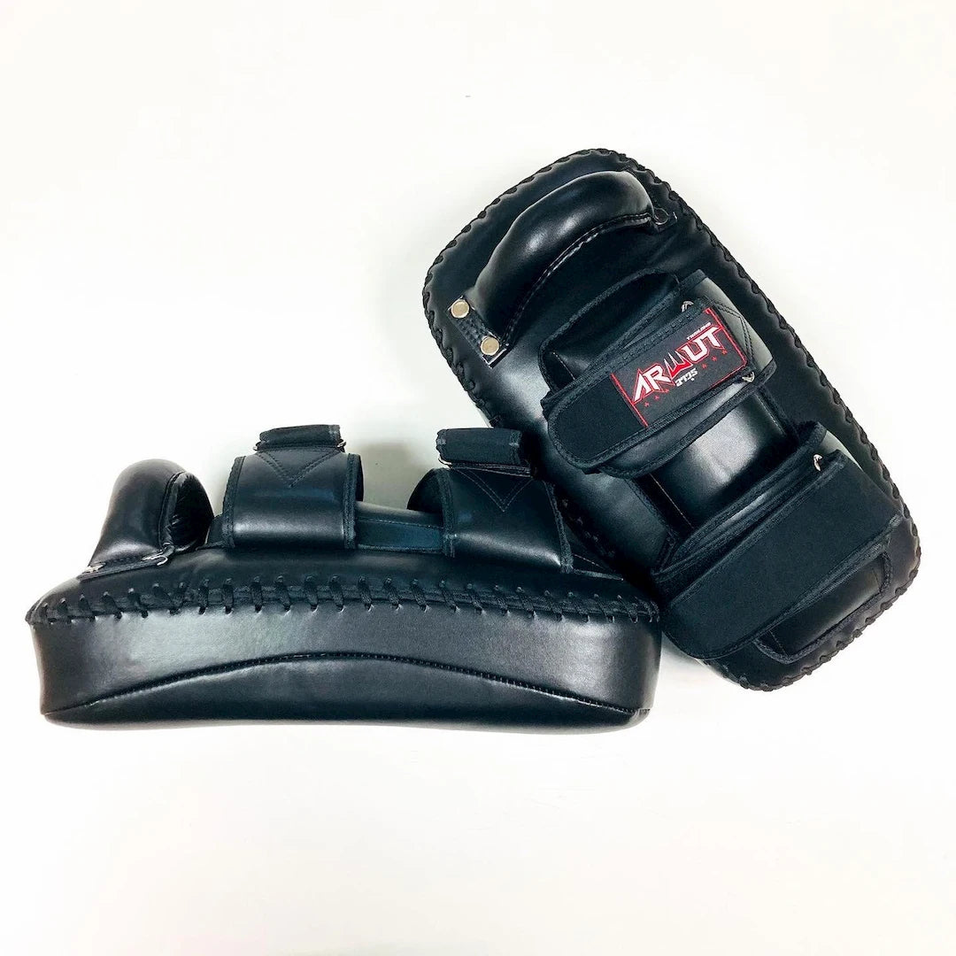 Pair of black martial arts Thai pads with a brand logo on a white background