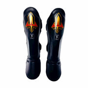 Pair of black Arwut shin guards with red and yellow logo on a white background