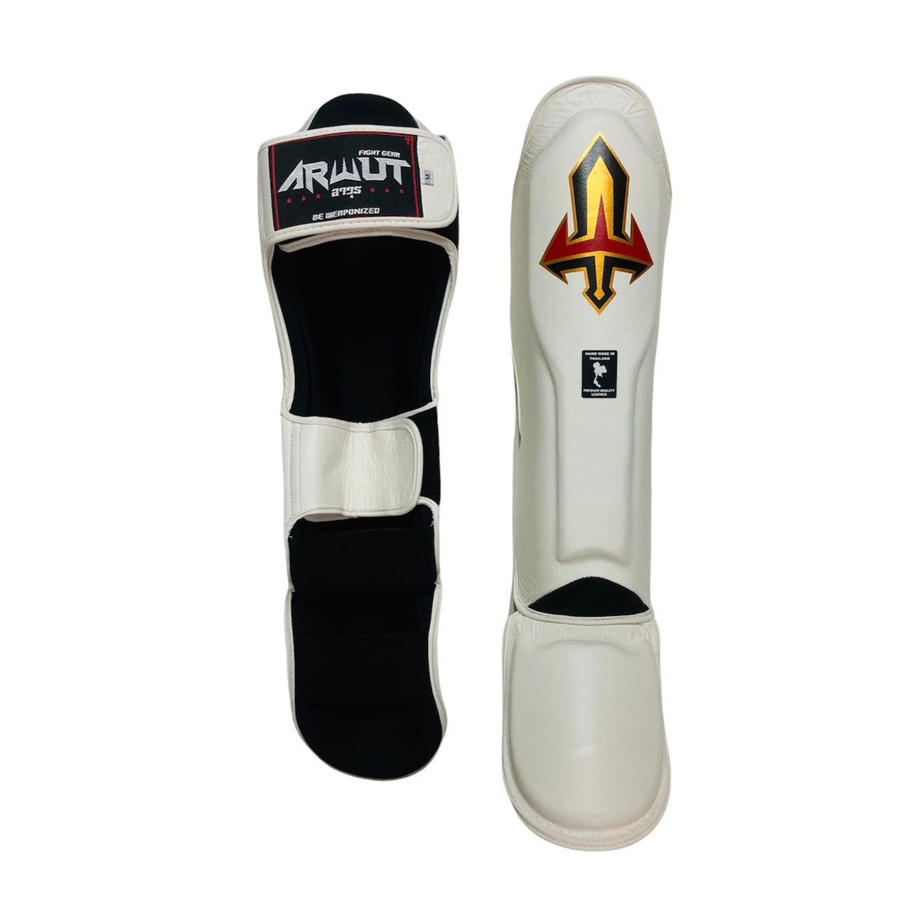 Pair of white Muay Thai shin guards with brand logo on a white background
