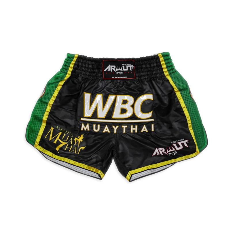 Black Muay Thai shorts with green and yellow accents featuring WBC and Arwut branding on a white background.