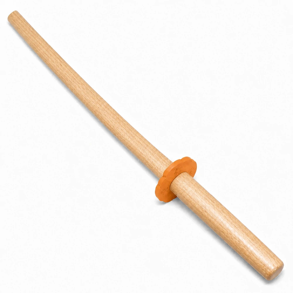 Beech Bokken sword with a floral Tsuba on a white background