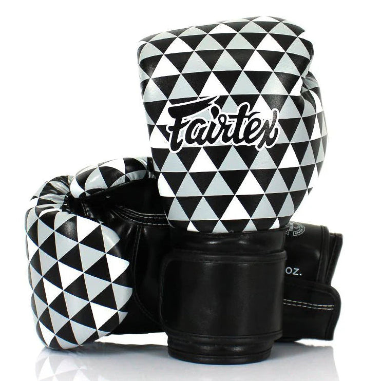 Black and white checkered boxing gloves with Fairtex logo on a white background
