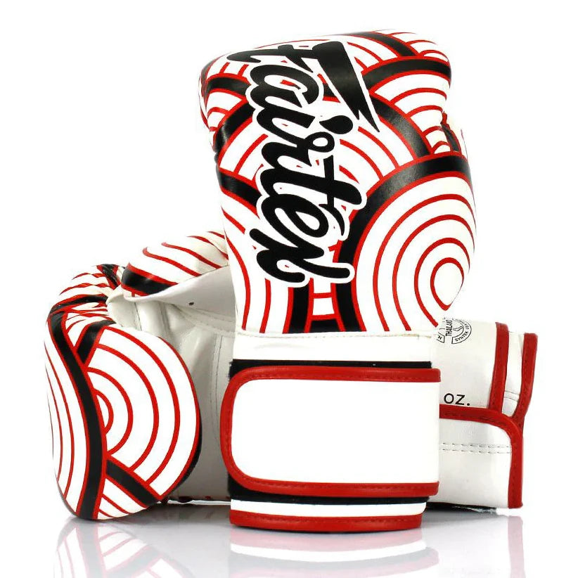 Pair of boxing gloves with red, white, and black design on a white background