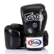 Black boxing gloves with Fairtex logo on a white background