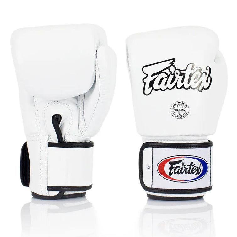 White boxing gloves with Fairtex logo on a white background