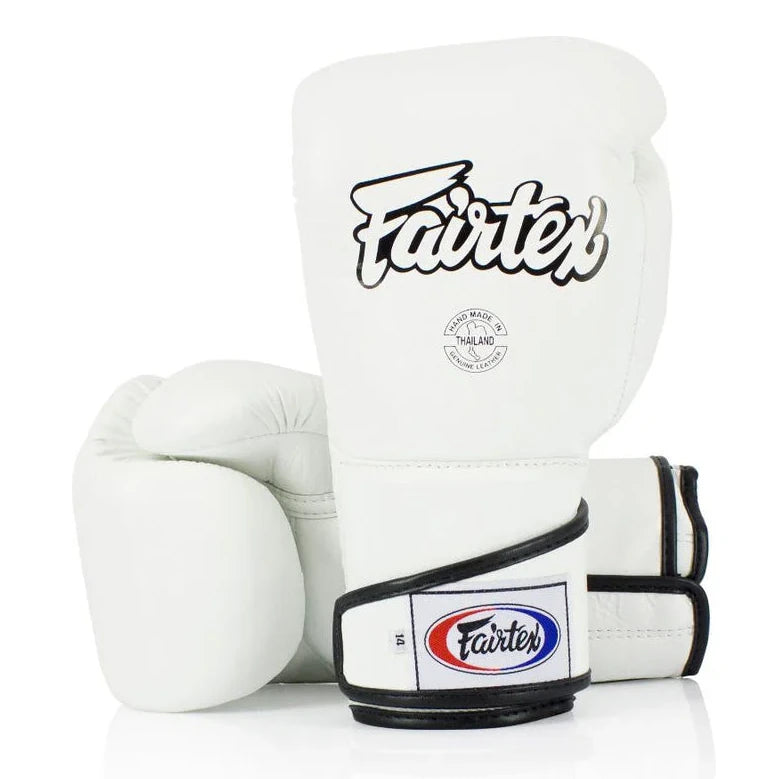 White boxing gloves with Fairtex logo on a white background
