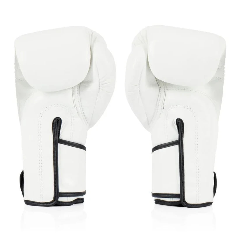 Pair of white boxing gloves with black accents on a white background