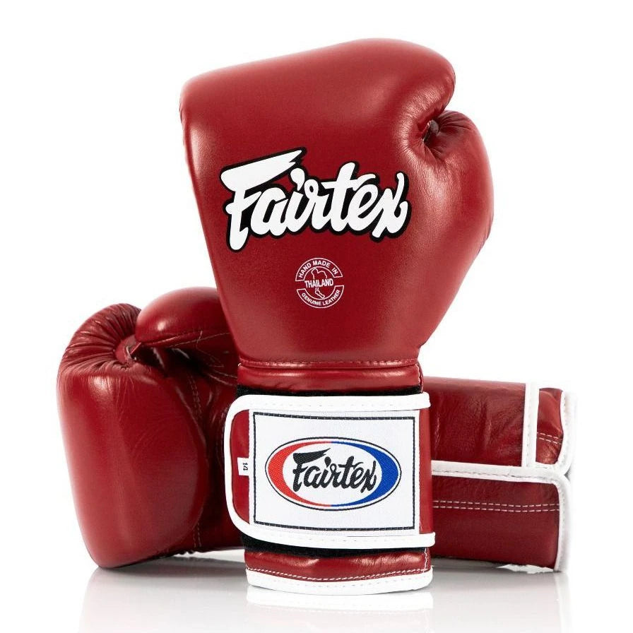 Red boxing glove with Fairtex logo on a white background