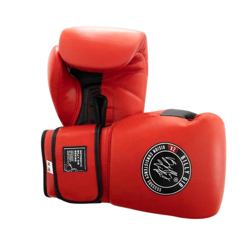 Red boxing gloves with a brand logo on a white background