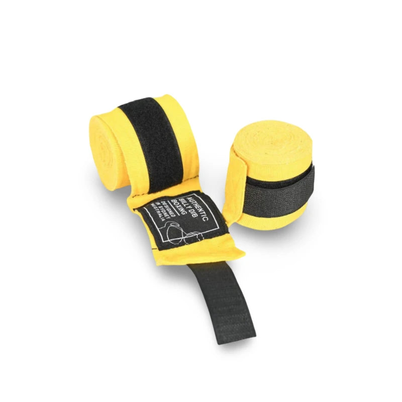 Yellow boxing hand wraps with black straps on a white background