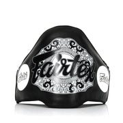 Black belly pad with white decorative patterns and 'Fairtex' branding on a white background