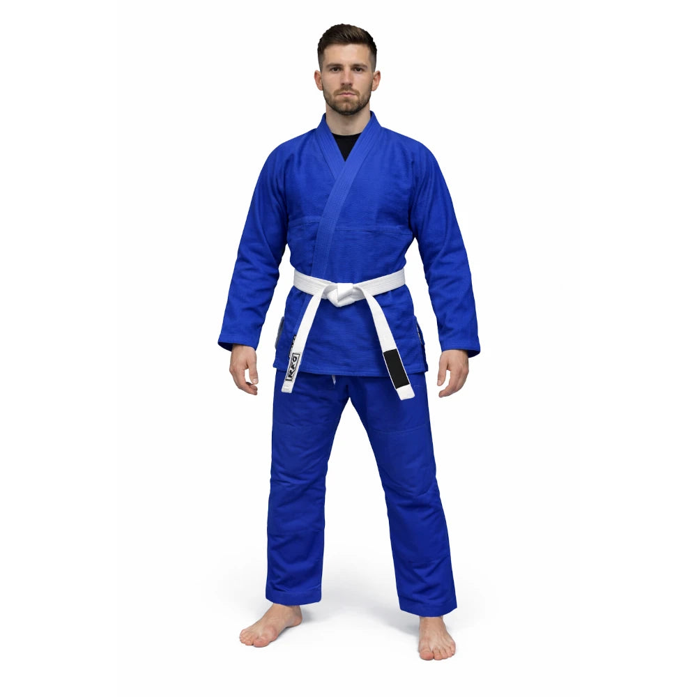 Man wearing a blue martial arts uniform with a white belt on a white background