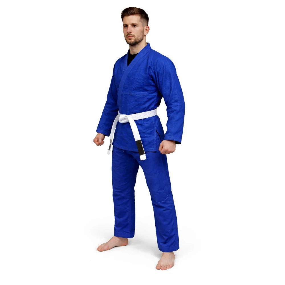 Man wearing a blue martial arts uniform with a white belt on a white background