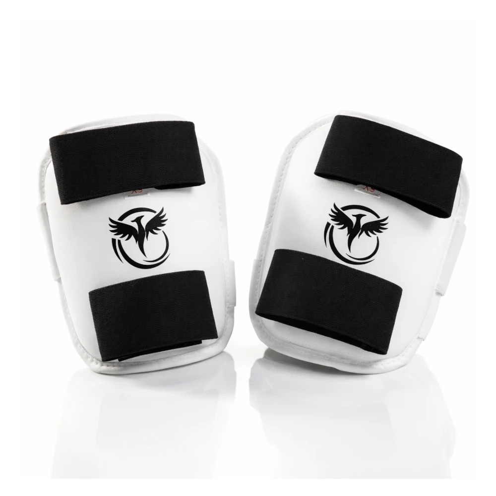 Two white arm guards with black straps and logos on a white background