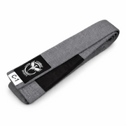Gray bjj belt with a black label featuring a logo and text on a white background