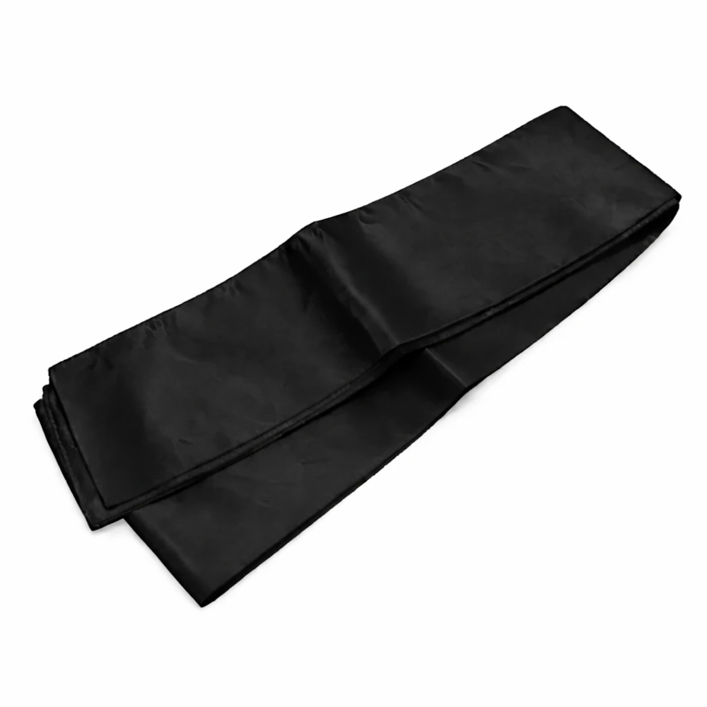 Folded black fabric on a white background