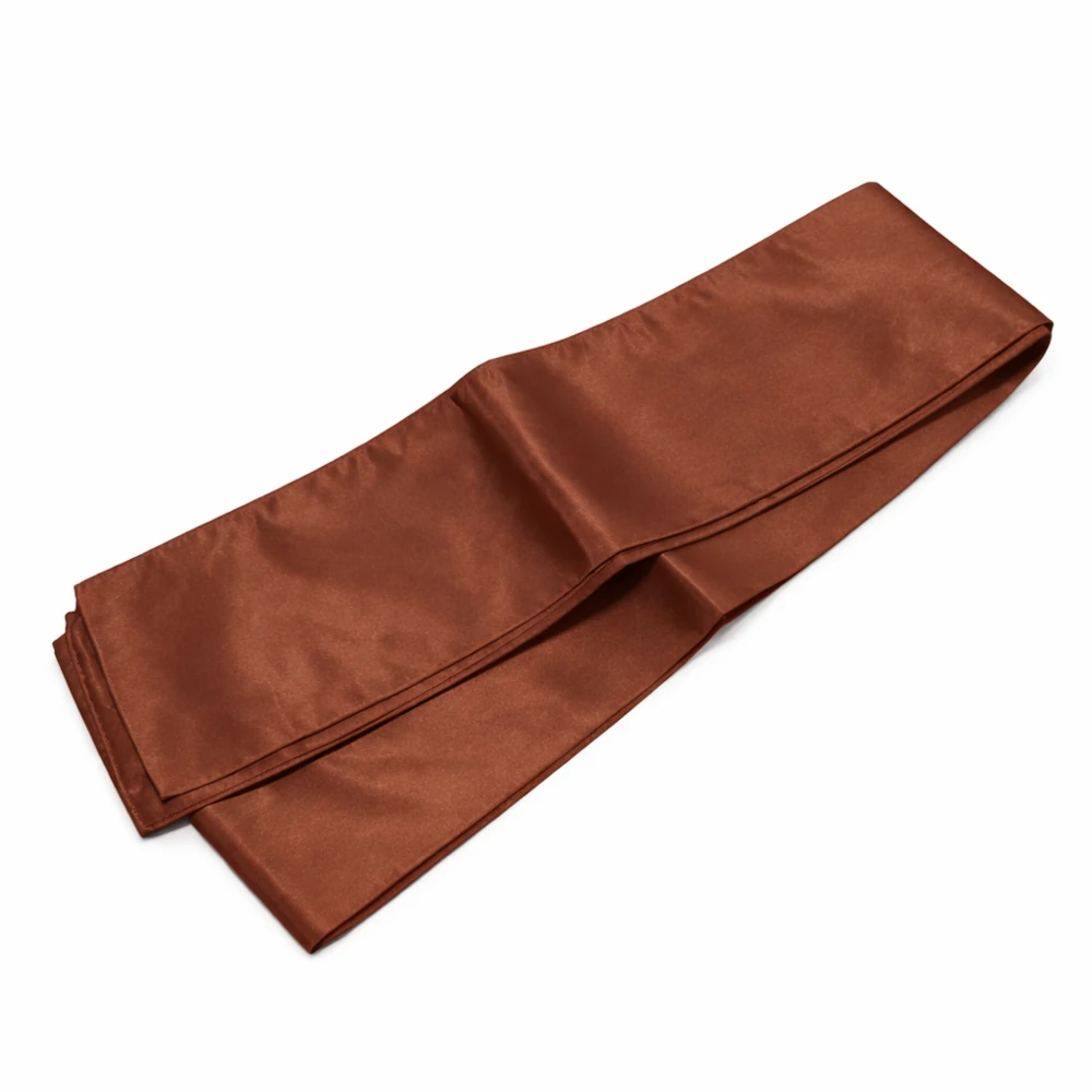 Folded brown fabric on a white background