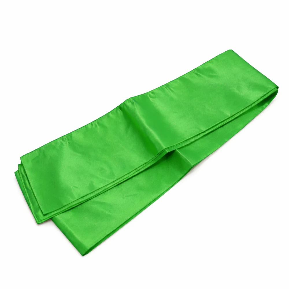 Folded green fabric on a white background