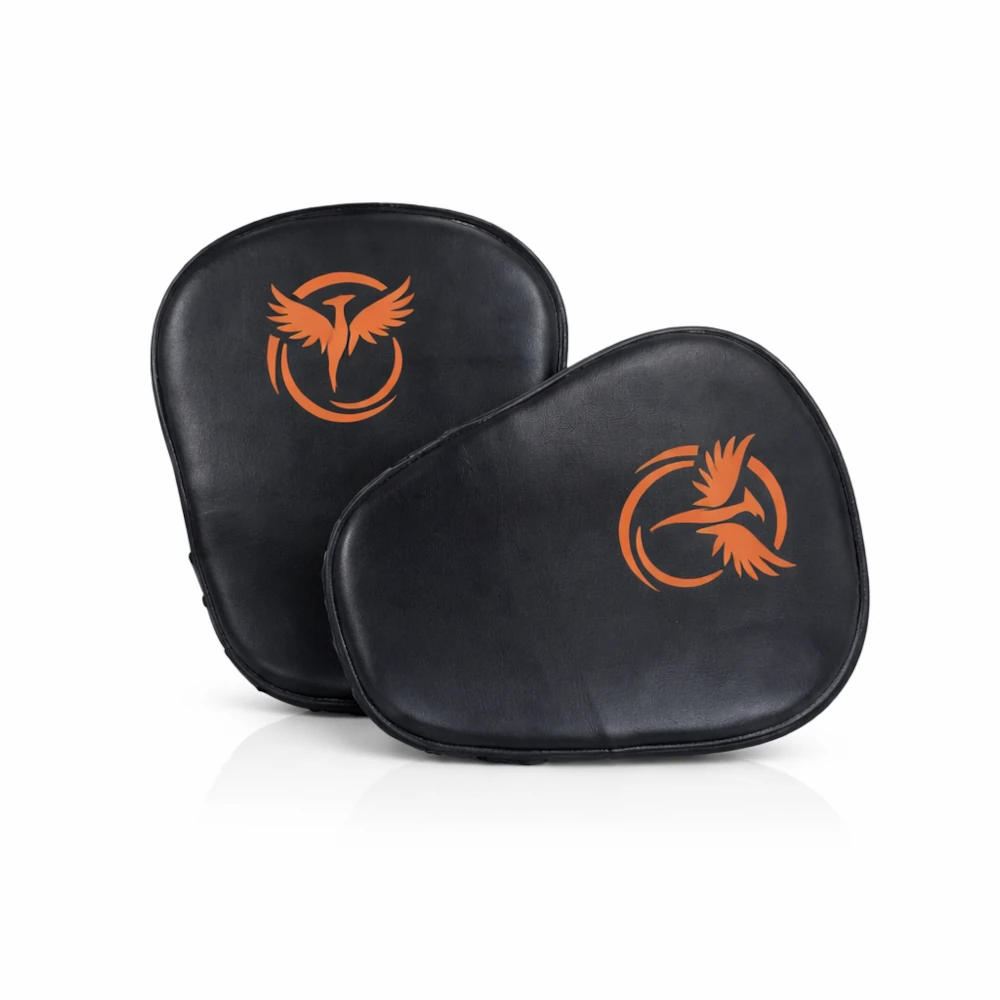 Two black boxing pads with orange logos on a white background