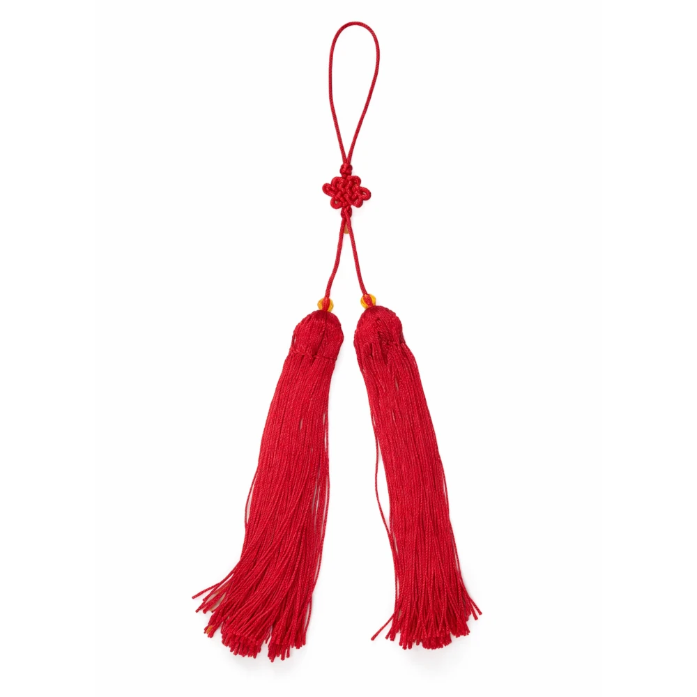 Red tassel on a white background