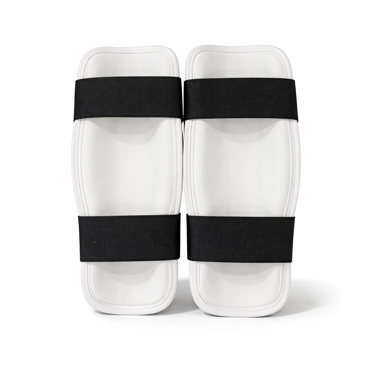 Rearside of a pair of white shin guards with black bands on a white background