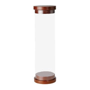 Clear cylindrical martial arts belt container with wooden lid and base on a white background