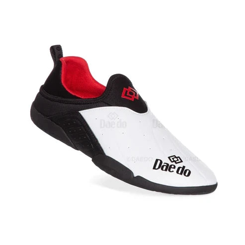 Black and white Daedo training shoe with red lining on a white background