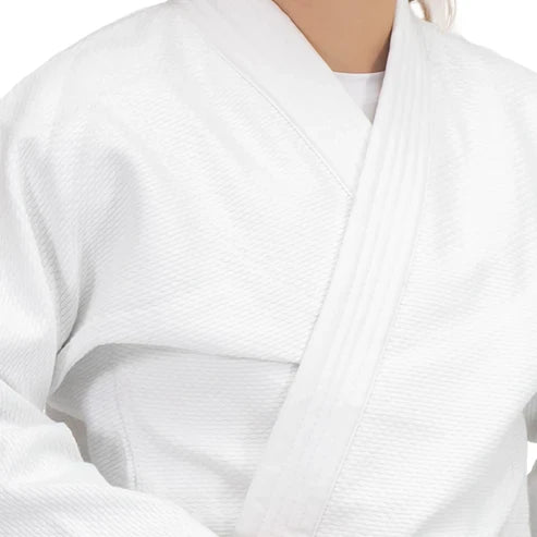 Close-up of a white gi top on a woman