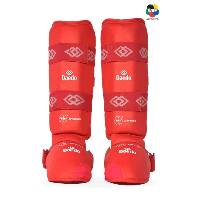 Red shin guards with 'Daedo' branding on a white background