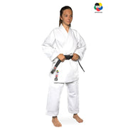 Young woman wearing a white martial arts uniform with a black belt on a white background, featuring the WMPF logo.