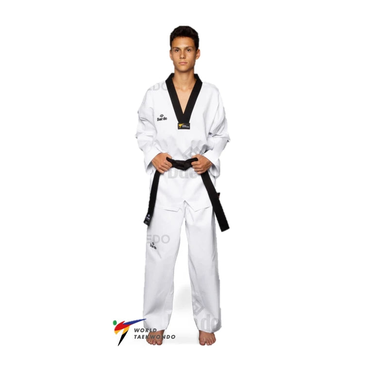 Male wearing a white martial arts uniform with a black belt on a white background