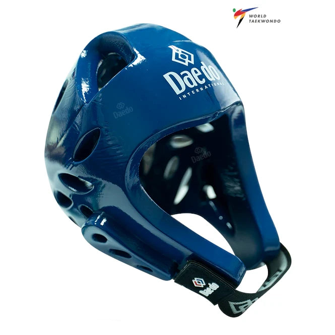 Blue taekwondo helmet with 'Daedo' branding on a white background