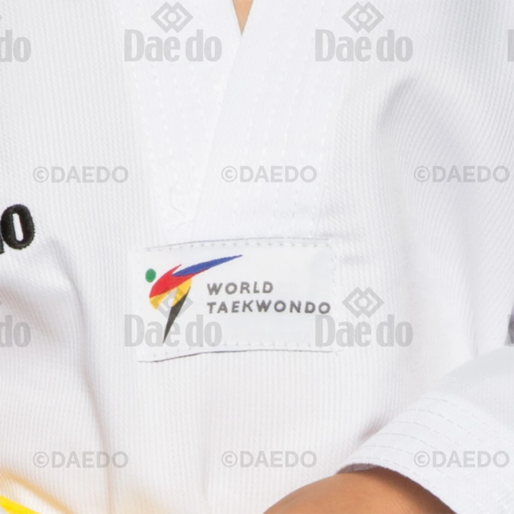 White martial arts uniform with World Taekwondo logo and 'Daedo' branding.