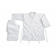 White bathrobe with grid pattern and matching towel on a white background