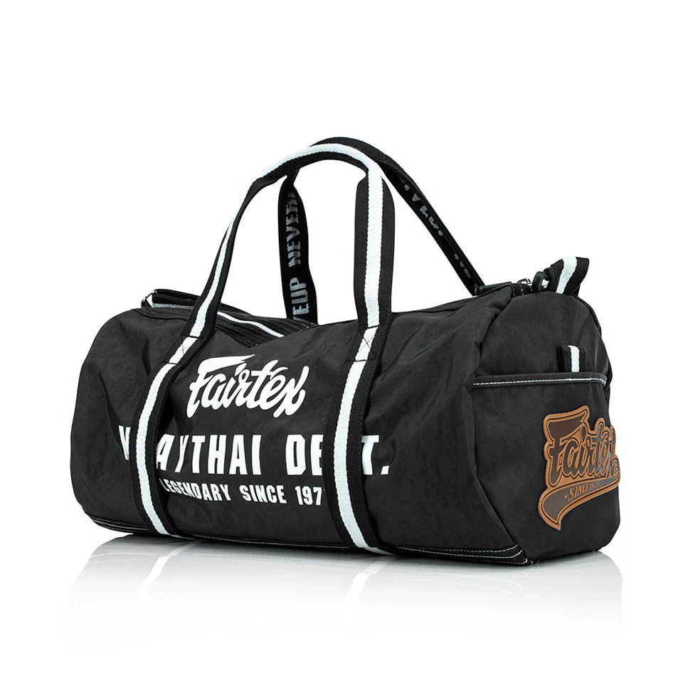 Black duffel bag with Fairtex branding on a white background