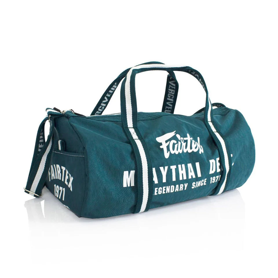 Teal duffel bag with white text on a white background
