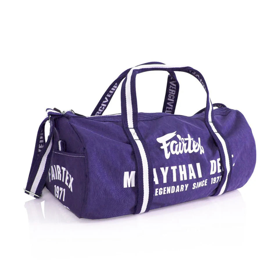 Purple duffel bag with Fairtex branding on a white background