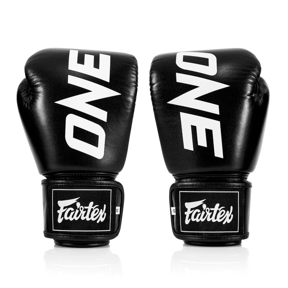 Pair of black boxing gloves with 'ONE' branding on a white background