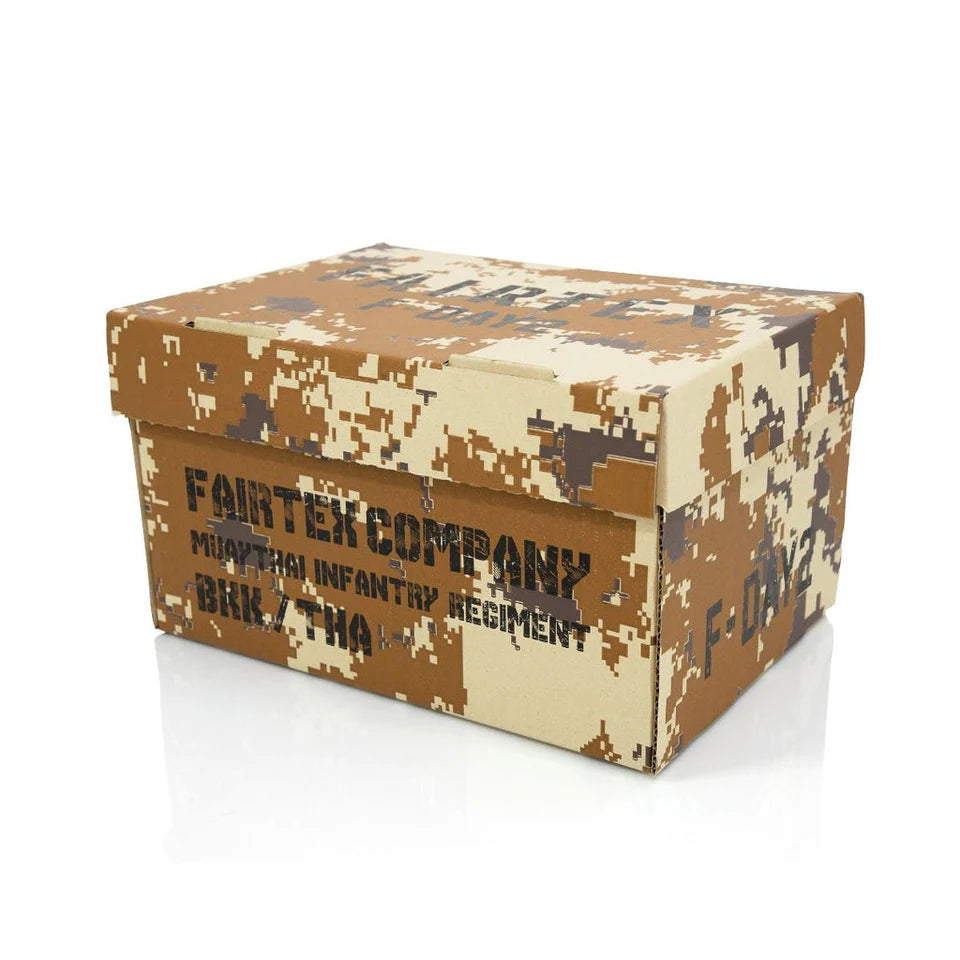 Camouflage-patterned box with text on a white background
