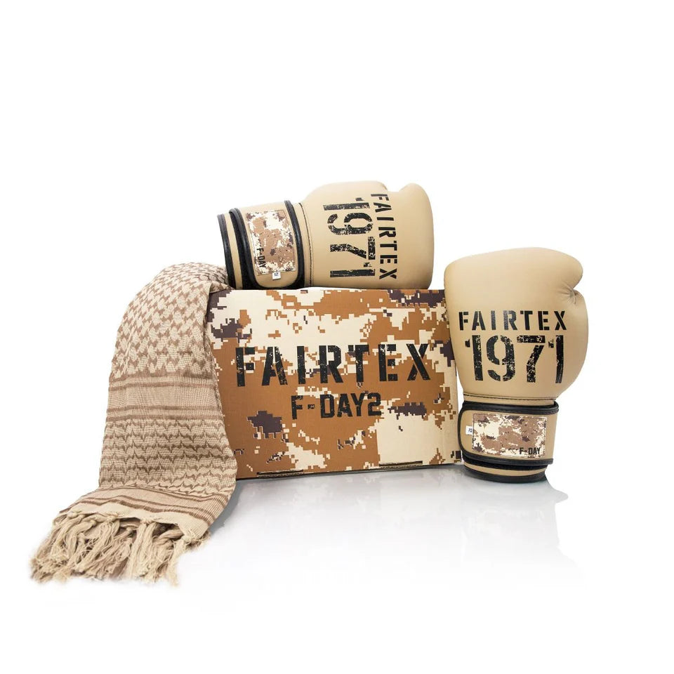 Fairtex boxing gloves and headgear with camouflage design on a white background