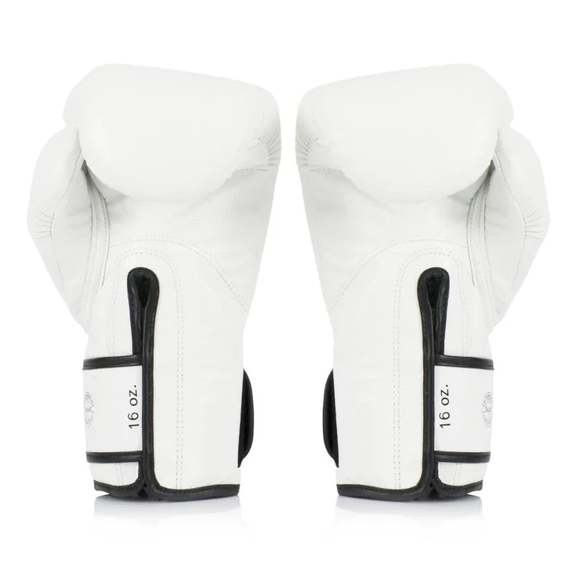 Pair of white boxing gloves with black accents on a white background